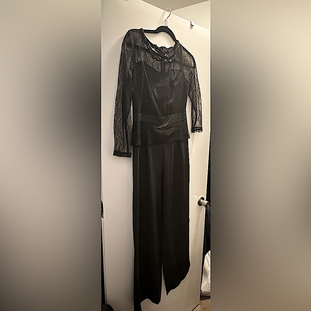 Lace top one piece jumpsuit. Never worn.